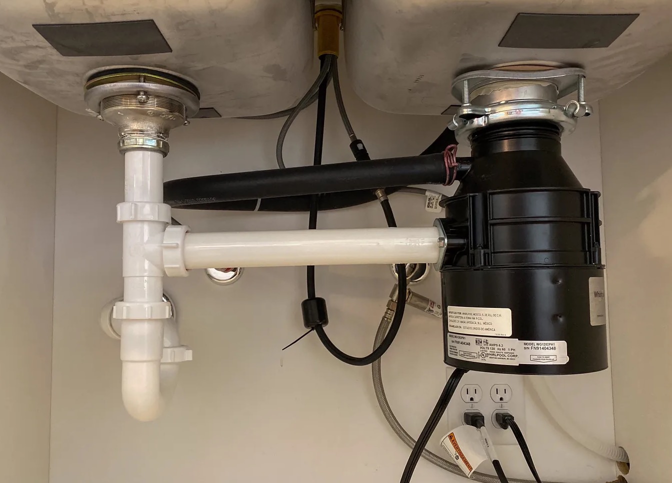 Leaky Garbage Disposal Cleanup in Euless, TX